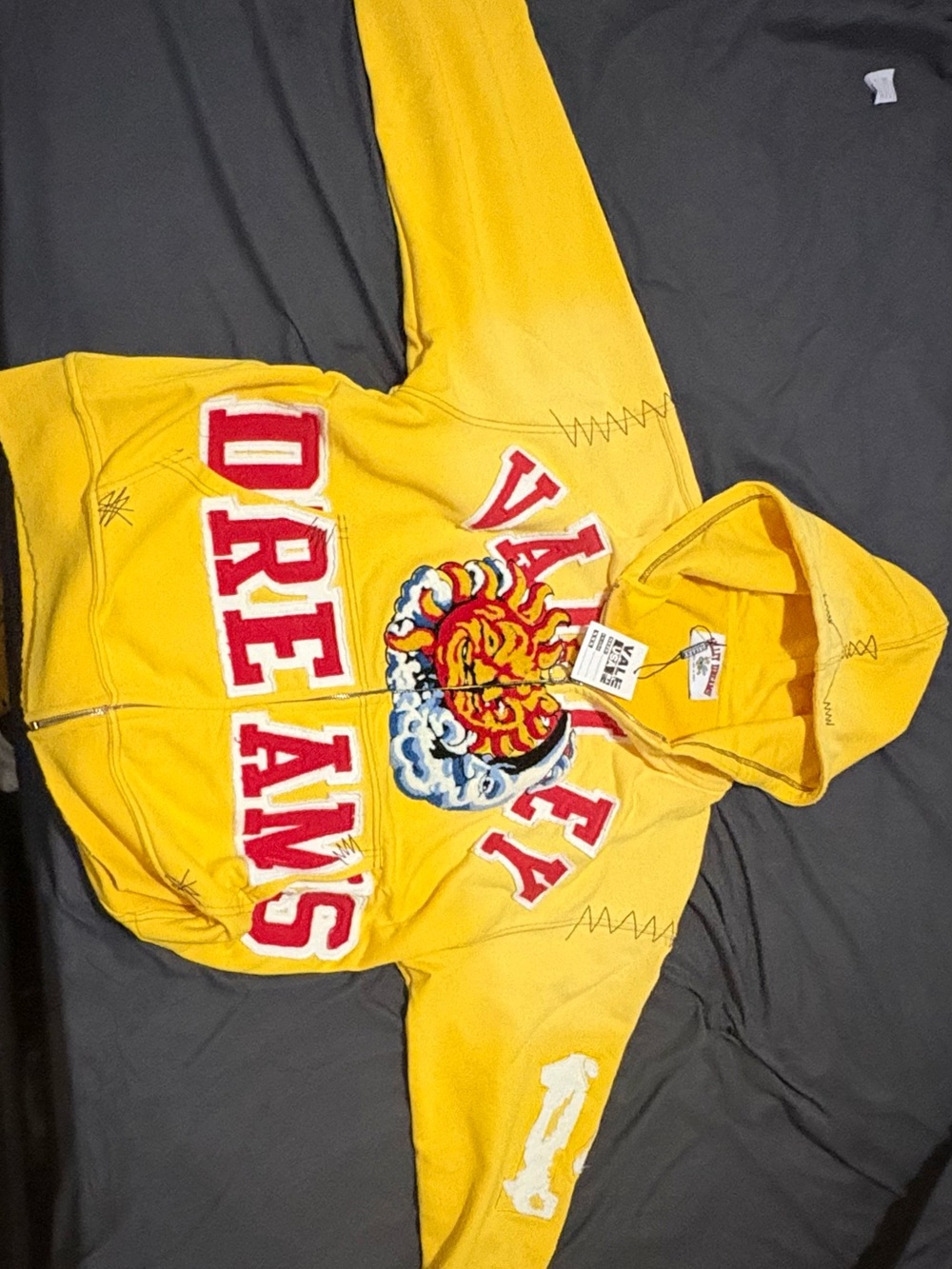 Yellow Zip-Up Hooded Sweatshirt with 'DREAMS' Graphic